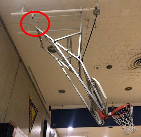 ceiling-suspended-basketball-system-in-need-of-repair